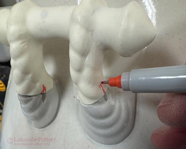 Marking new hand for slot cutting location