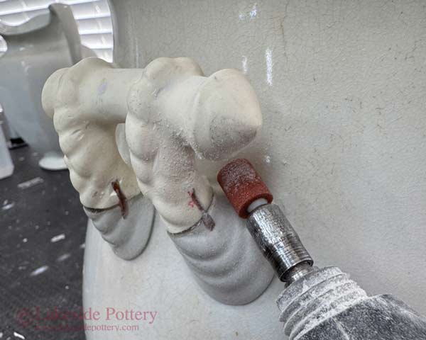 Grinding handle for fitting flush