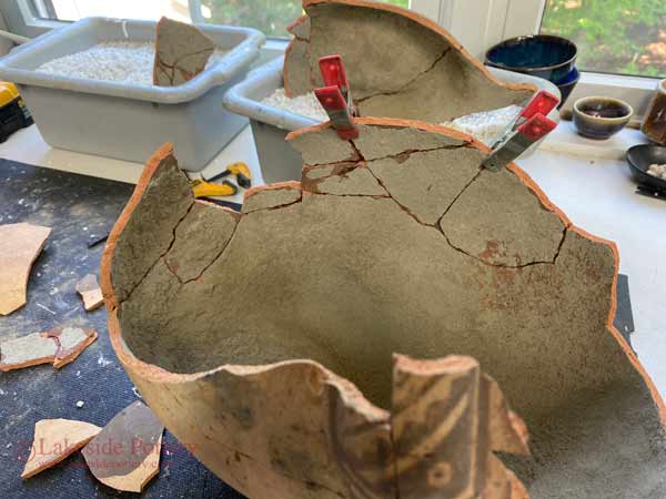 Broken Inca Pottery repair in process