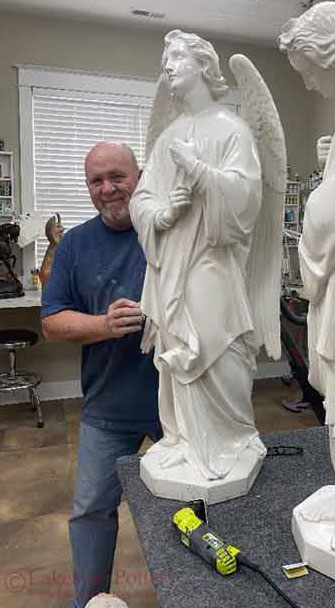 Angel statues repair for a a church