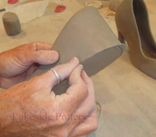 blend the joint of the slip and scored pieces