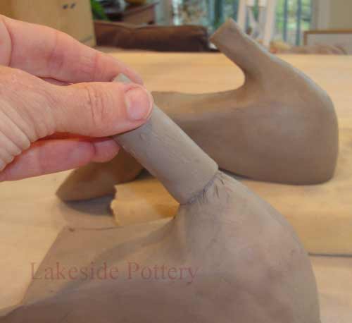 place clay piece and mark for scoring