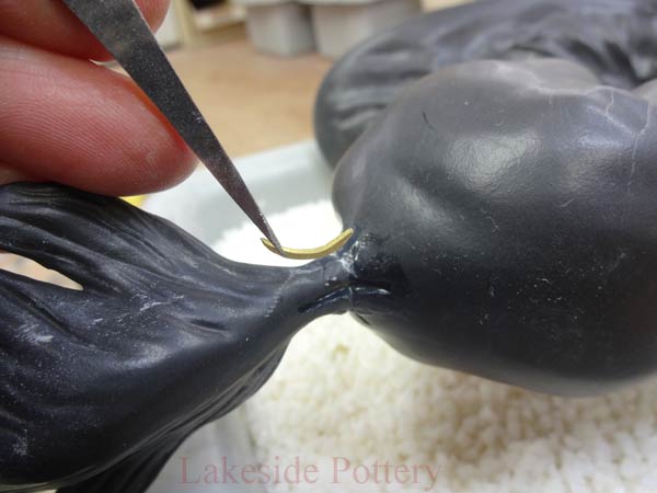 Metal peg insersion pottery repair