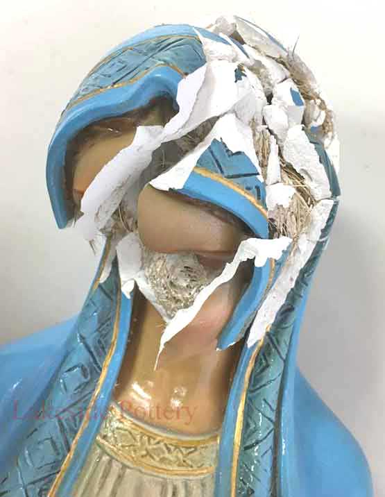 Large african boy statue repaired