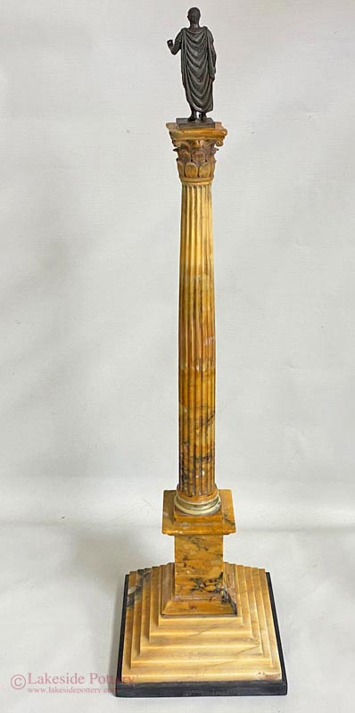 An Italian Grand Tour bronze mounted giallo antico and nero antico marble model of the Column of Phocas, Rome, Circa 1880.  Restored