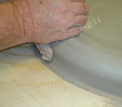 start spreading the wall to increase bottom width