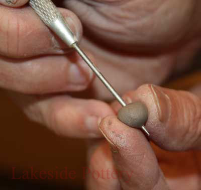 cennter the pot to be trimmed